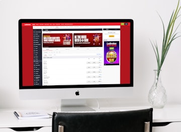 An example of how the Ladbrokes website homepage looks on i Mac