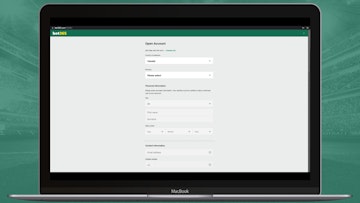 Bet365 website open on a macbook air with sign up sheet visible