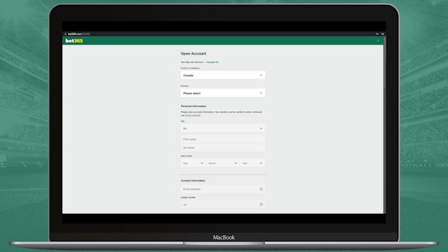 Bet365 website open on a macbook air with sign up sheet visible
