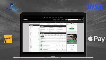 Betway website open on a macbook air with paypal visa interac and apple pay logos visible in the background