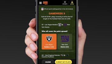 Player holding iphone displaying 888sport 10k drive free to play game