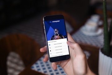 Man signing up for a Moneyball betting account on mobile