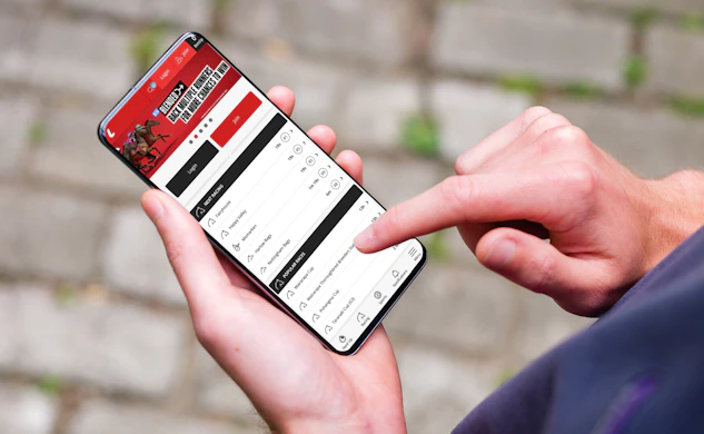Man using the ladbrokes betting agency on mobile