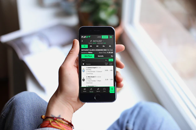 Placing a bet on the melbourne cup with the playup app on an iphone 6s