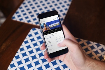 Man betting on basketball with moneyball app
